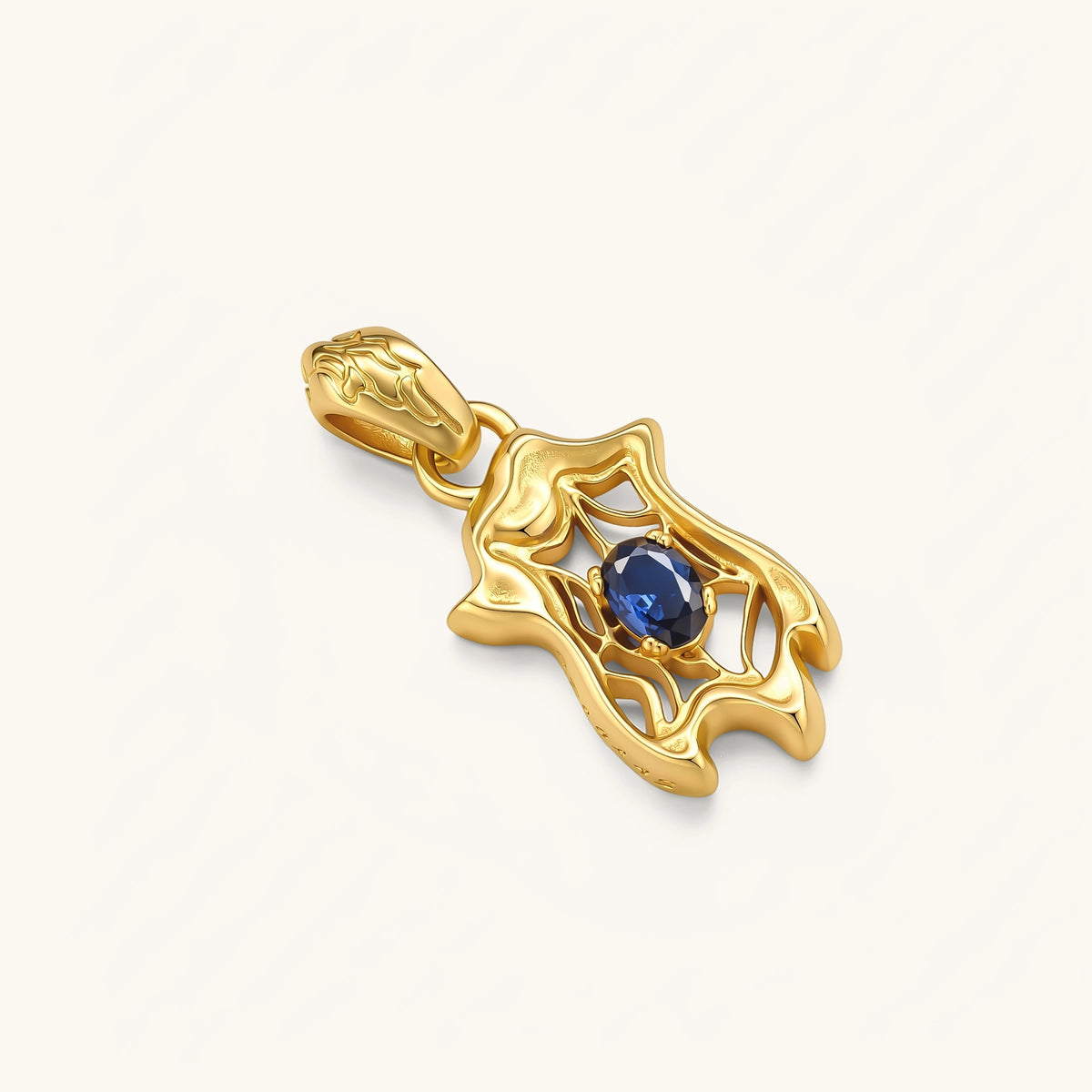 Gold-plated 925 silver spider web pendant with oval blue sapphire stone on a box chain, 37mm long.