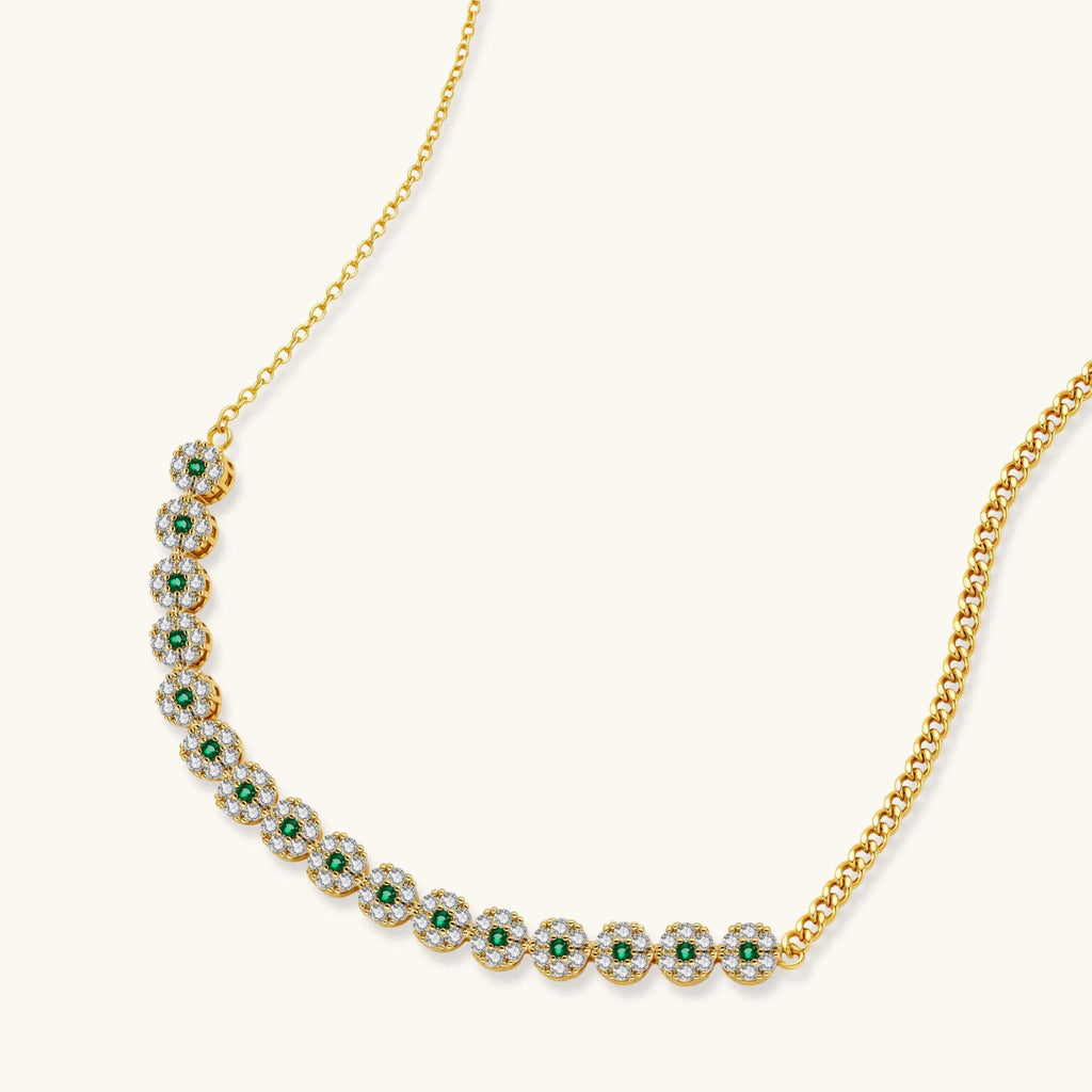 Gold plated necklace with green and clear zirconia flower clusters and matching drop earrings with white round beads.