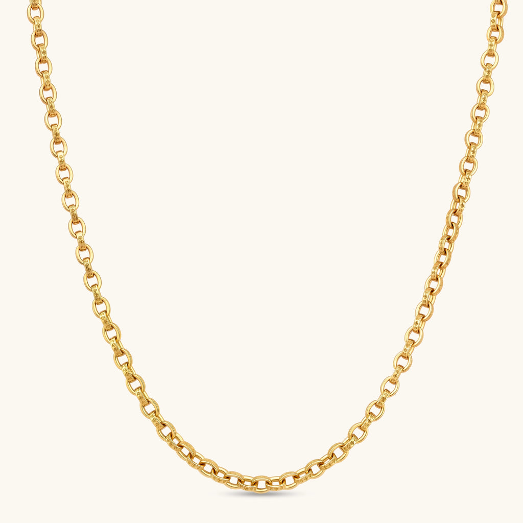 24K gold plated oval cable chain necklace with engraved links and cylindrical barrel clasp, 650mm length.