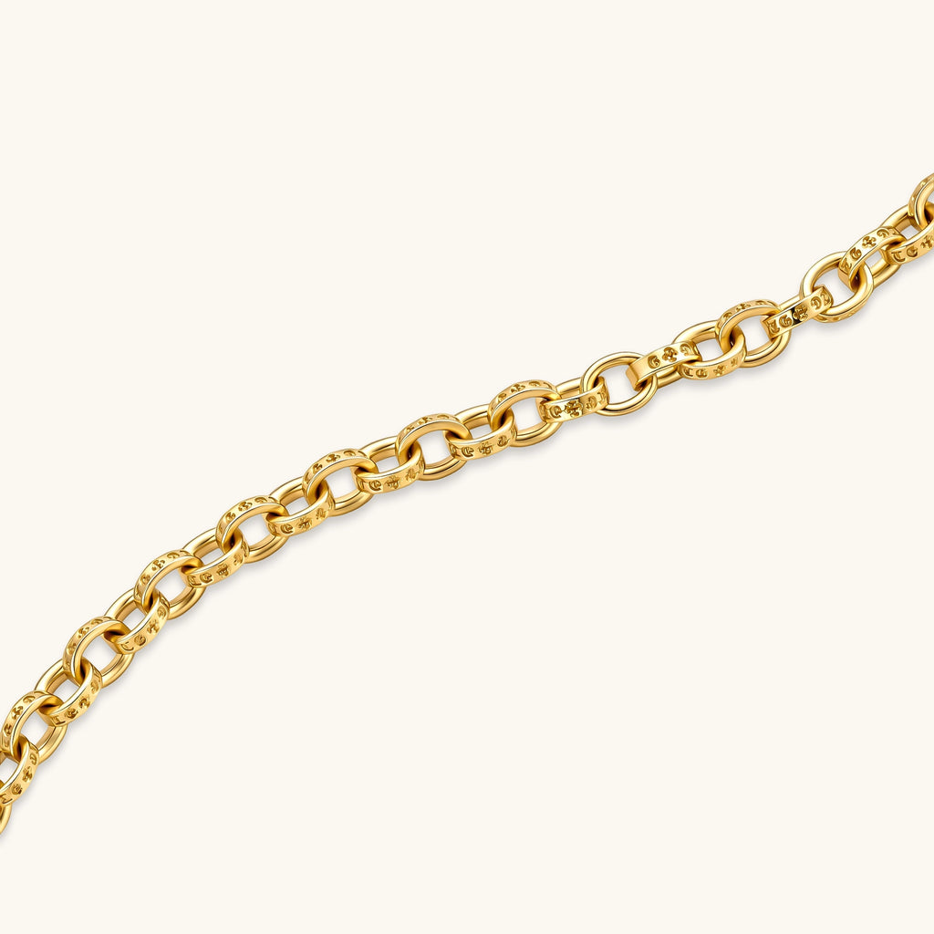 24K gold plated oval cable chain necklace with engraved links and cylindrical barrel clasp, 650mm length.